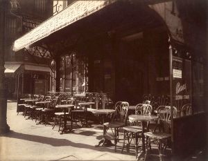 "Café, Avenue de la Grande-Armée, 1924–25" by Eugène Atget - Metropolitan Museum of Art, online database: entry 190036464. Licensed under Public Domain via Wikimedia Commons - http://commons.wikimedia.org/wiki/File:Caf%C3%A9,_Avenue_de_la_Grande-Arm%C3%A9e,_1924%E2%80%9325.jpg#mediaviewer/File:Caf%C3%A9,_Avenue_de_la_Grande-Arm%C3%A9e,_1924%E2%80%9325.jpg